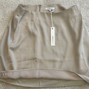 Tan skirt and blouse set, both skirt and wrap top size medium.